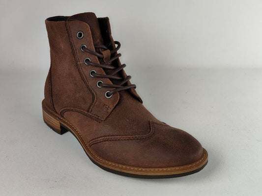 A brown suede lace-up ankle boot with a low stacked heel and contrast stitching, shown from a three-quarters angle on a light gray background.