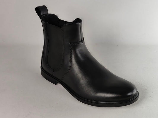 A single black leather Chelsea boot with elastic side panels and a pull tab, photographed on a light gray studio background.