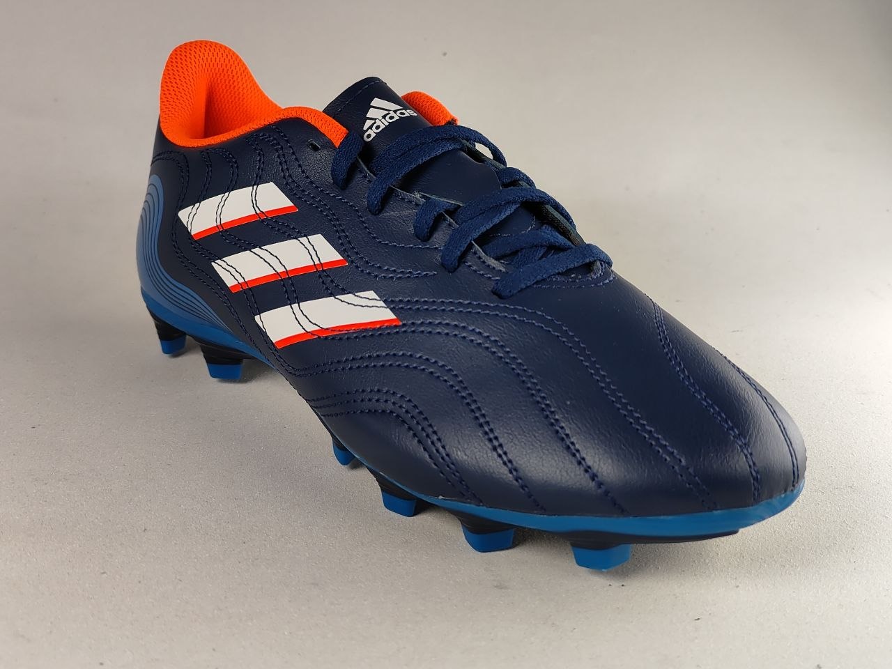 Adidas-Copa-Sense.4-FxG-Football-Boots-Team Navy-Bright-Blue-Solar-Orange-