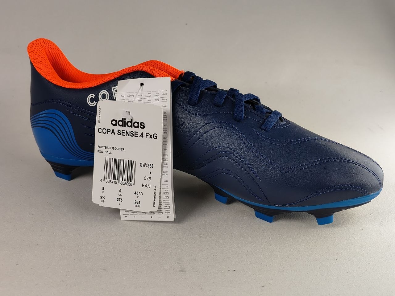 Adidas-Copa-Sense.4-FxG-Football-Boots-Team Navy-Bright-Blue-Solar-Orange-