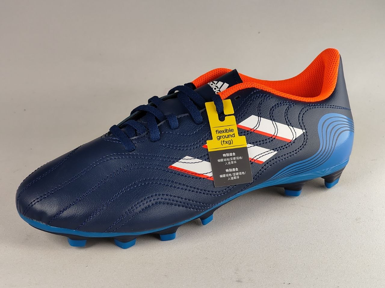 Adidas-Copa-Sense.4-FxG-Football-Boots-Team Navy-Bright-Blue-Solar-Orange-