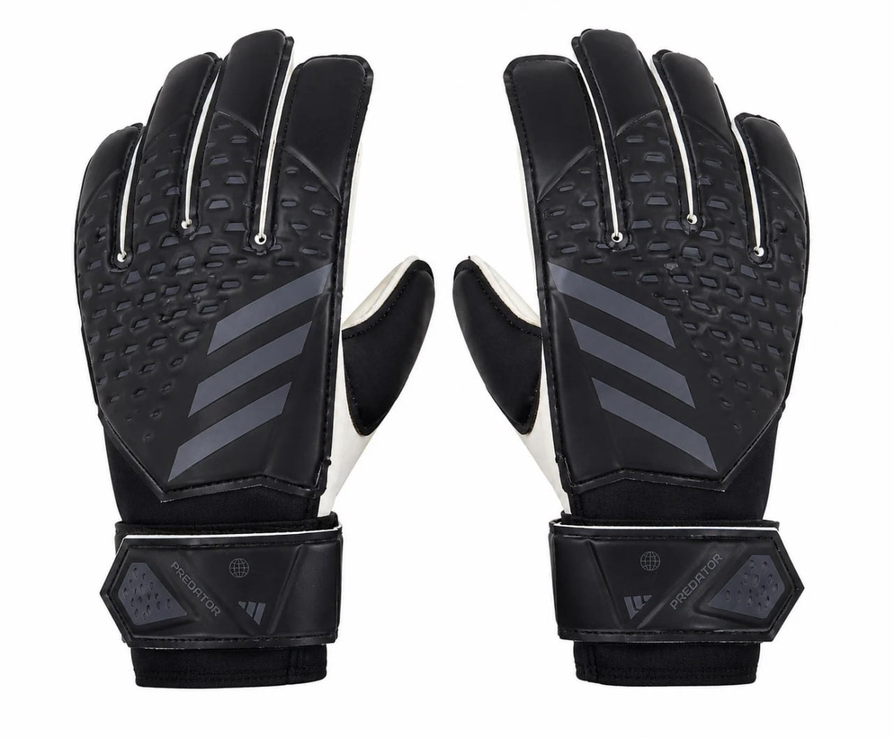 Black gloves with textured palm and Adidas logo on a white background