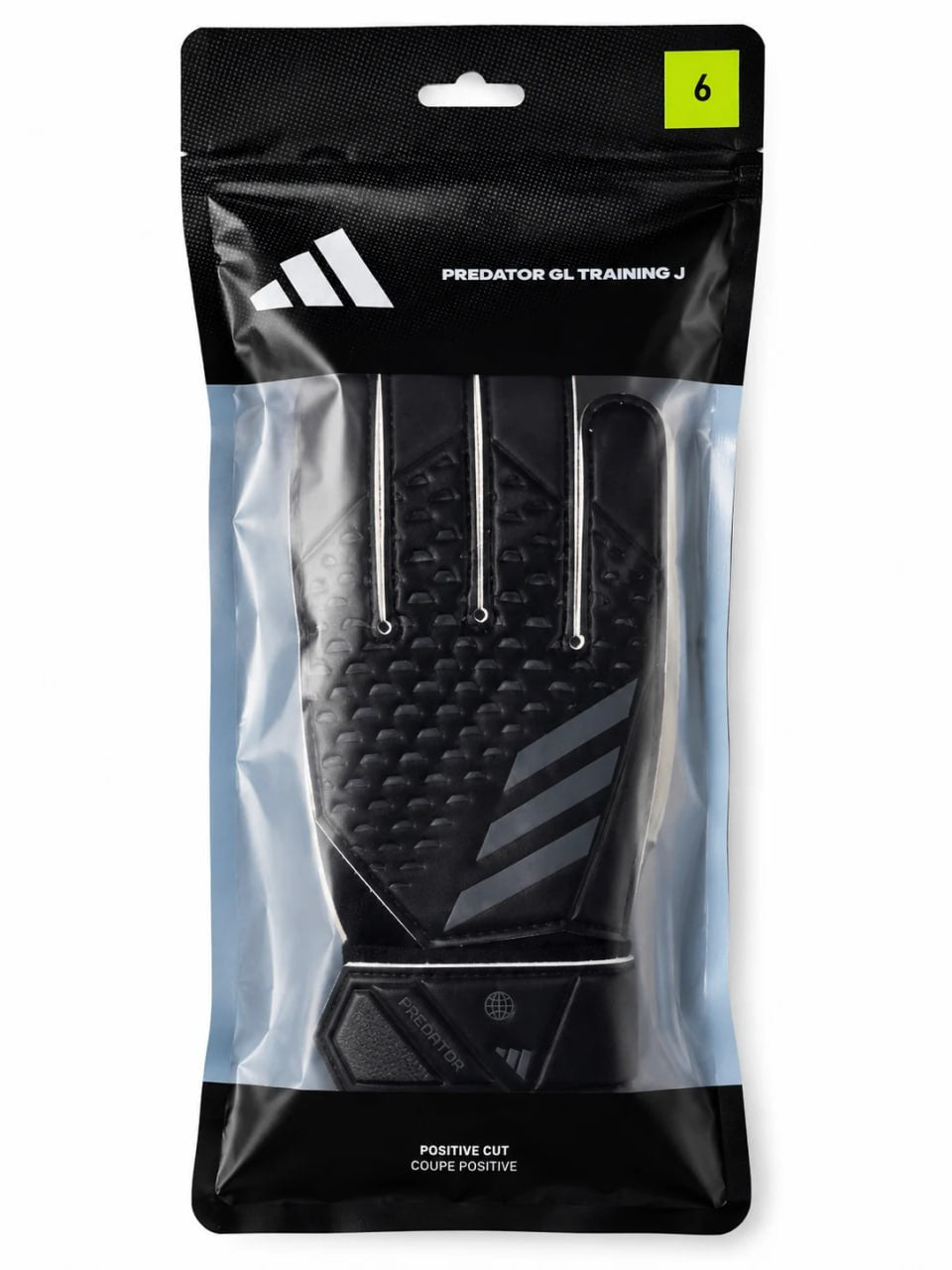 Black Adidas soccer cleat in packaging on a white background