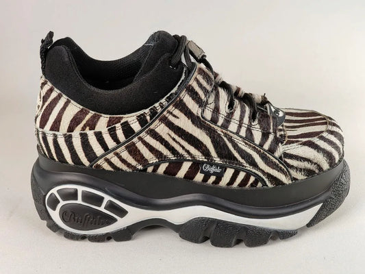 Zebra-patterned Buffalo-London-1339 with black sole on a white background

