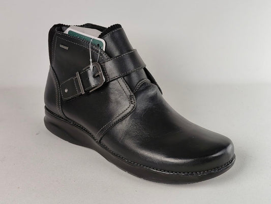 A black leather ankle boot with a hook-and-loop strap closure, shown from a side profile on a light gray background.