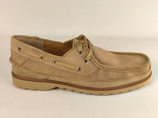 Beige boat shoe on a beige background