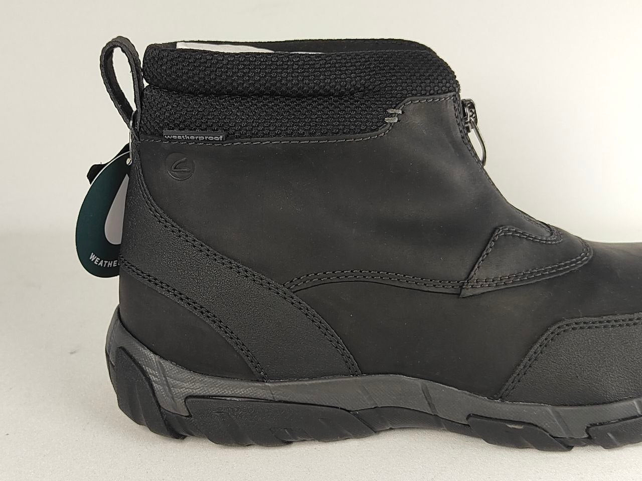 A black ankle-height work boot with a textured knit collar, side zipper, and a dark sole, shown from a side profile against a plain light background.