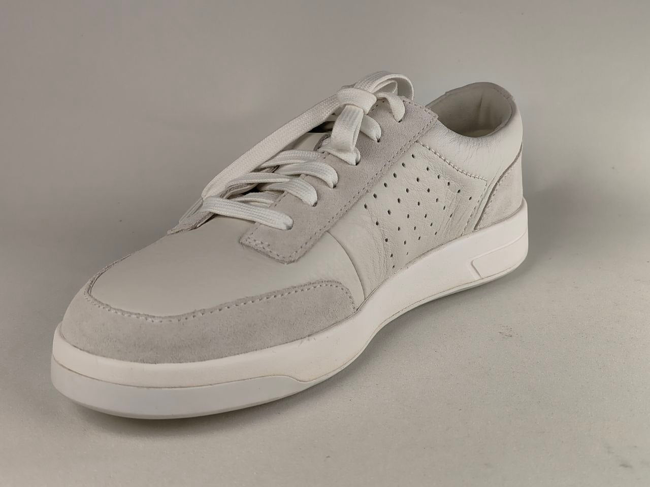 Gray sneaker on a gray background