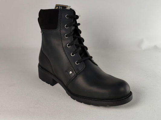 A black leather lace-up ankle boot with a chunky black sole and silver metal eyelets, photographed on a light gray background.
