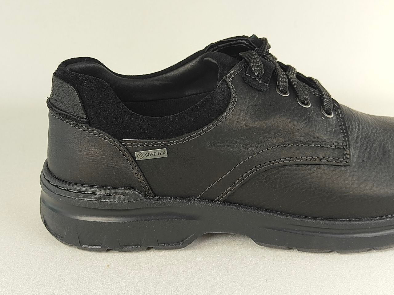 Black leather shoe on a white background