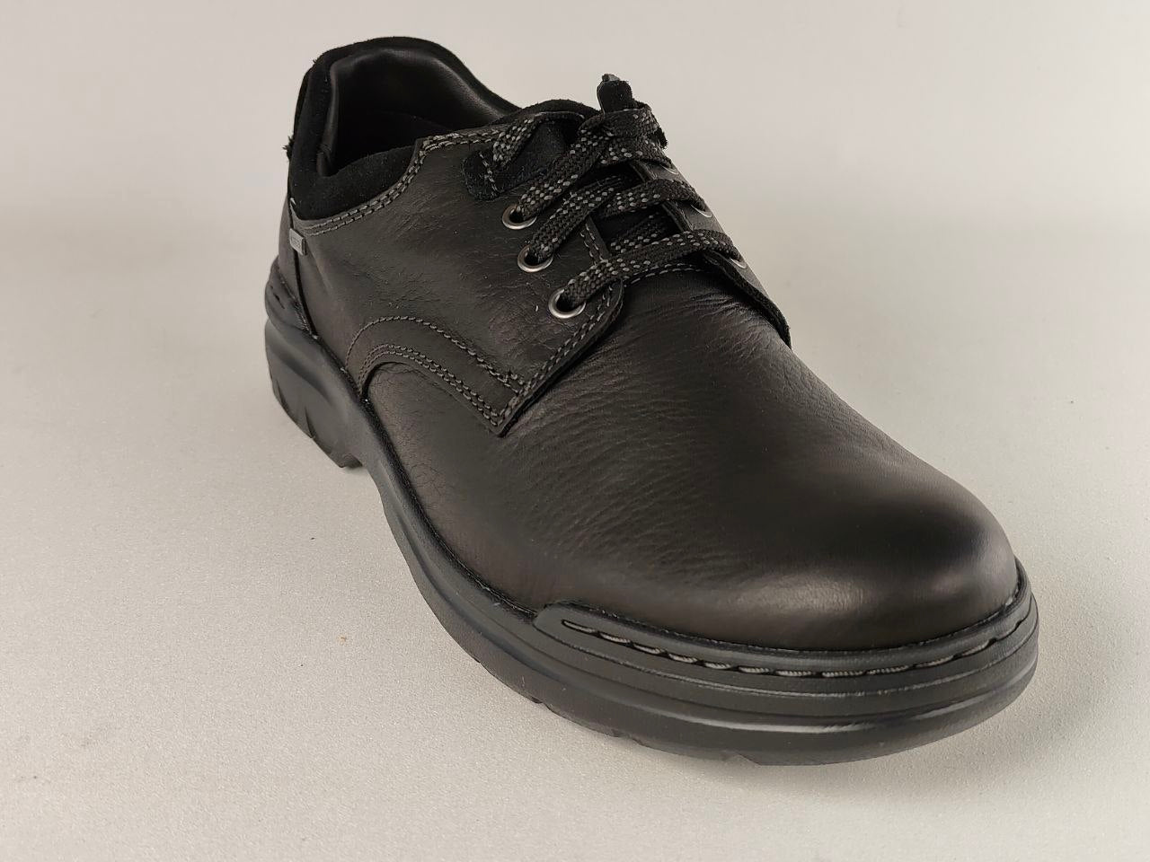 ClarksRockie2LoGTXBlackLeatherWaterproofShoes on a light gray background