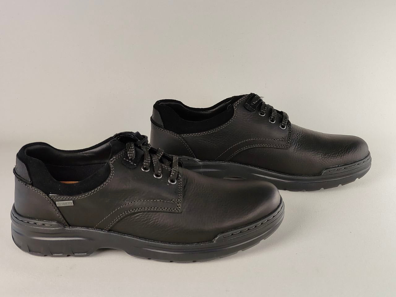 Clarks Rockie2 LoGTX Black Leather Waterproof Shoes on a light gray background
