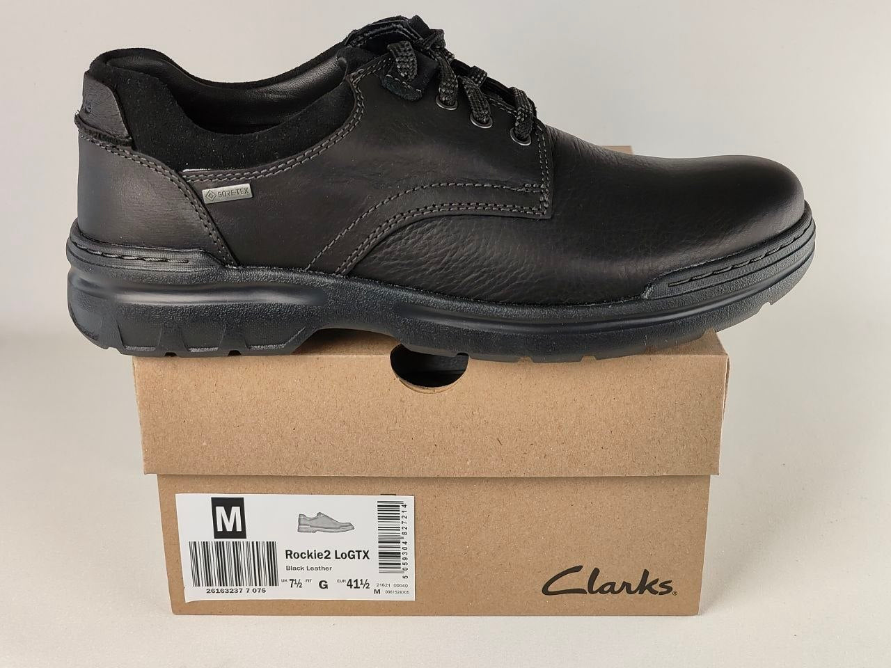 Clarks Rockie2 LoGTX Black Leather Waterproof Shoes on a cardboard box with a white background