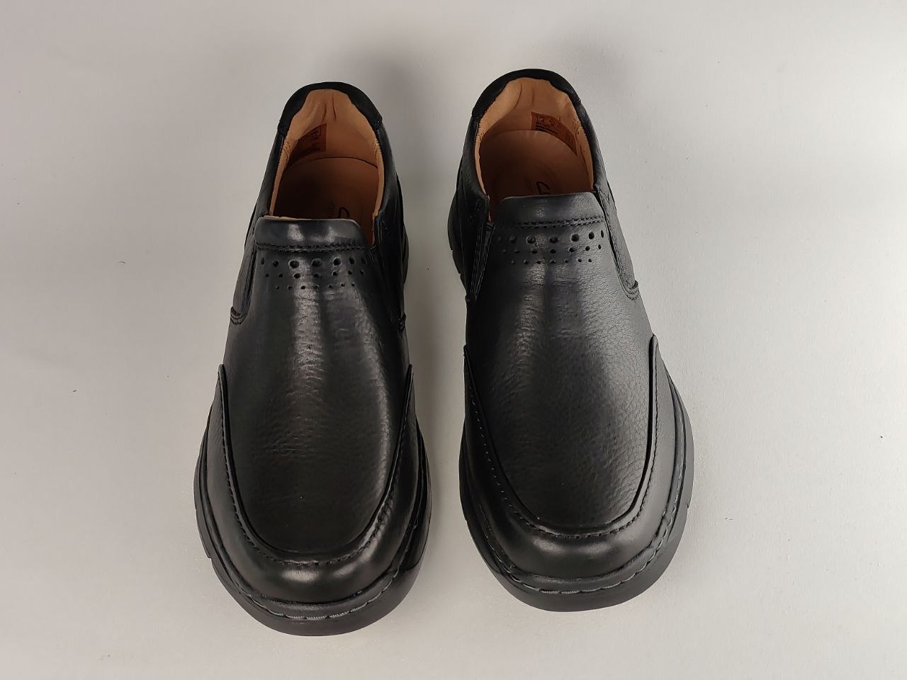 Clarks Un Brawley Step Black Leather Slip-On Shoes