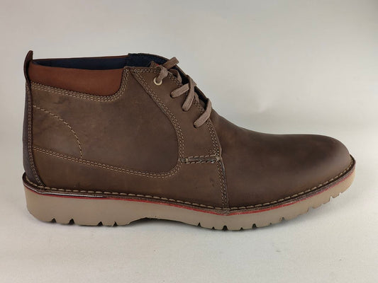 Brown leather boot on a white background