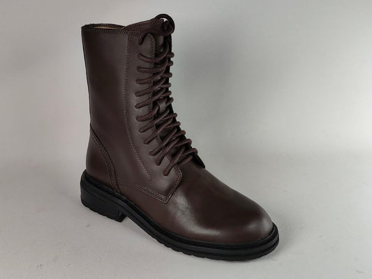 A dark brown leather lace-up boot with a black sole, photographed on a neutral light gray background.