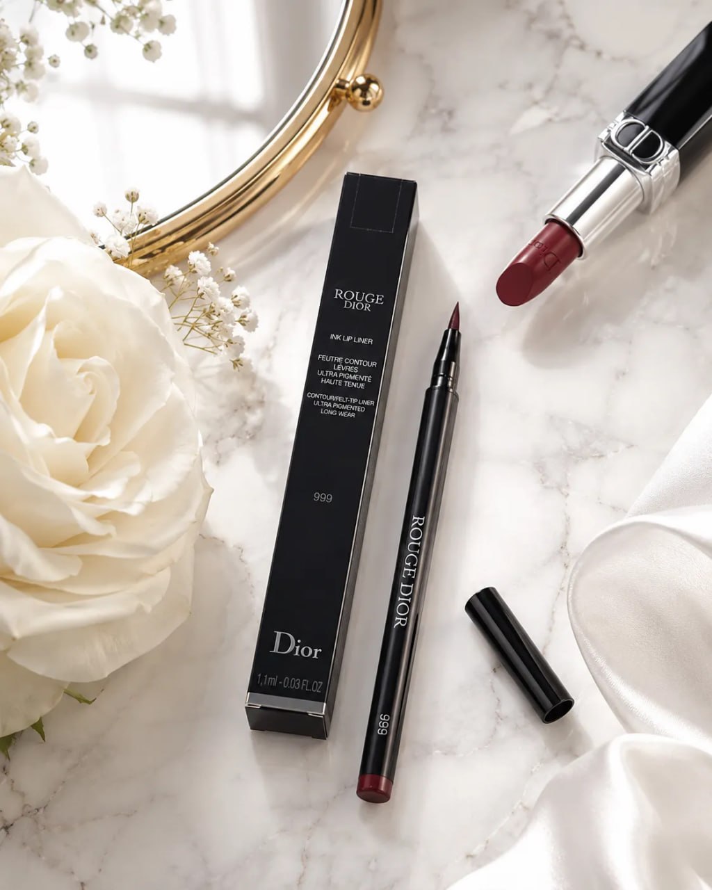 Dior makeup products including a lip liner and lipstick on a marble surface with flowers.