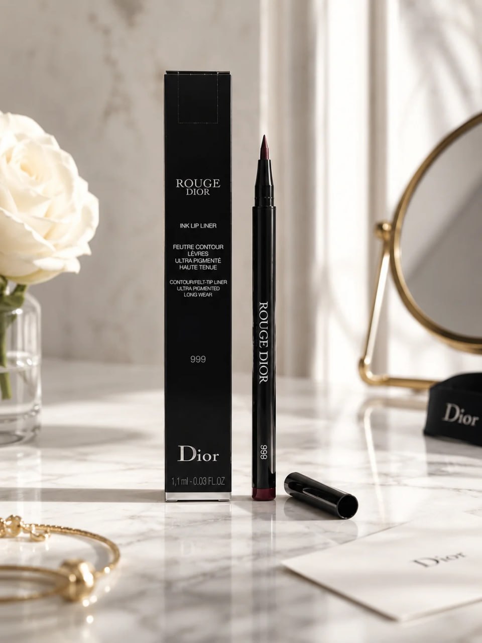 Dior lip liner with packaging on a marble surface