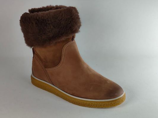 A brown suede ankle boot with a thick brown faux-fur collar and a tan rubber sole, shown from a side profile on a light gray background.