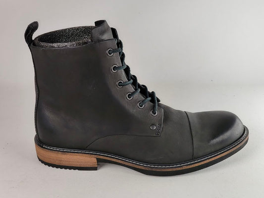A single dark gray leather lace-up ankle boot with a black sole and a light brown wooden heel block, shown from a side profile against a light gray background.