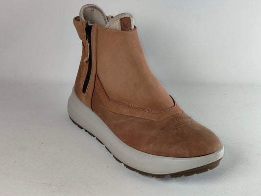 A single tan suede ankle boot with a side zipper, a thick white platform sole, and a brown rubber outsole, shown against a plain light gray background.