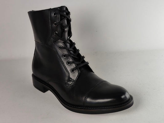 A single black leather lace-up ankle boot with a rounded toe and low block heel, photographed on a light gray studio background.