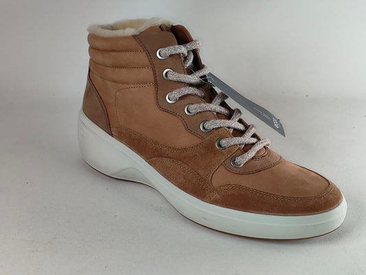A brown suede high-top sneaker with a white sole, light gray laces, and a white shearling-style lining, shown on a neutral light gray background with a product tag attached.