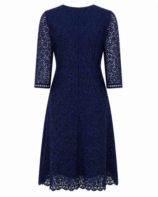 Navy lace dress with quarter-length sleeves on a white background