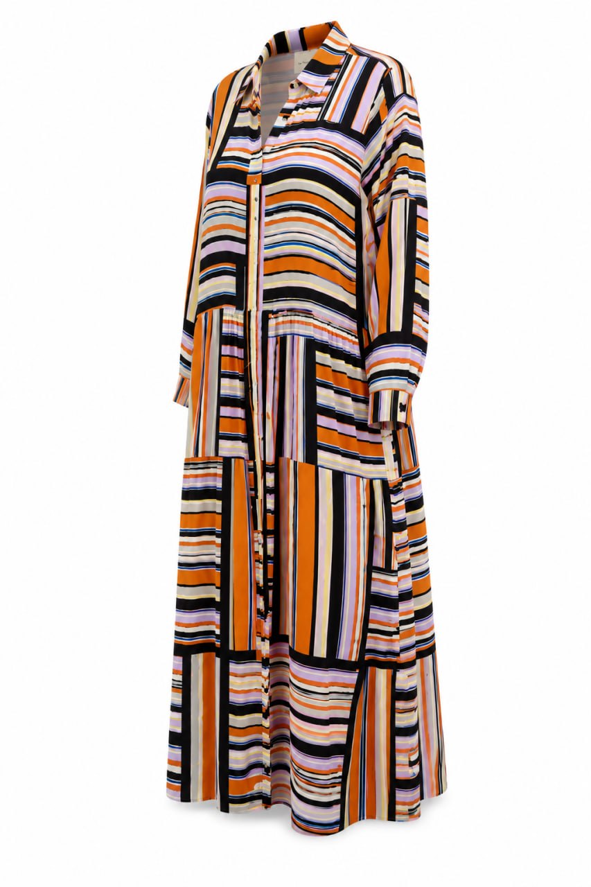 Long, patterned dress with vertical stripes on a white background