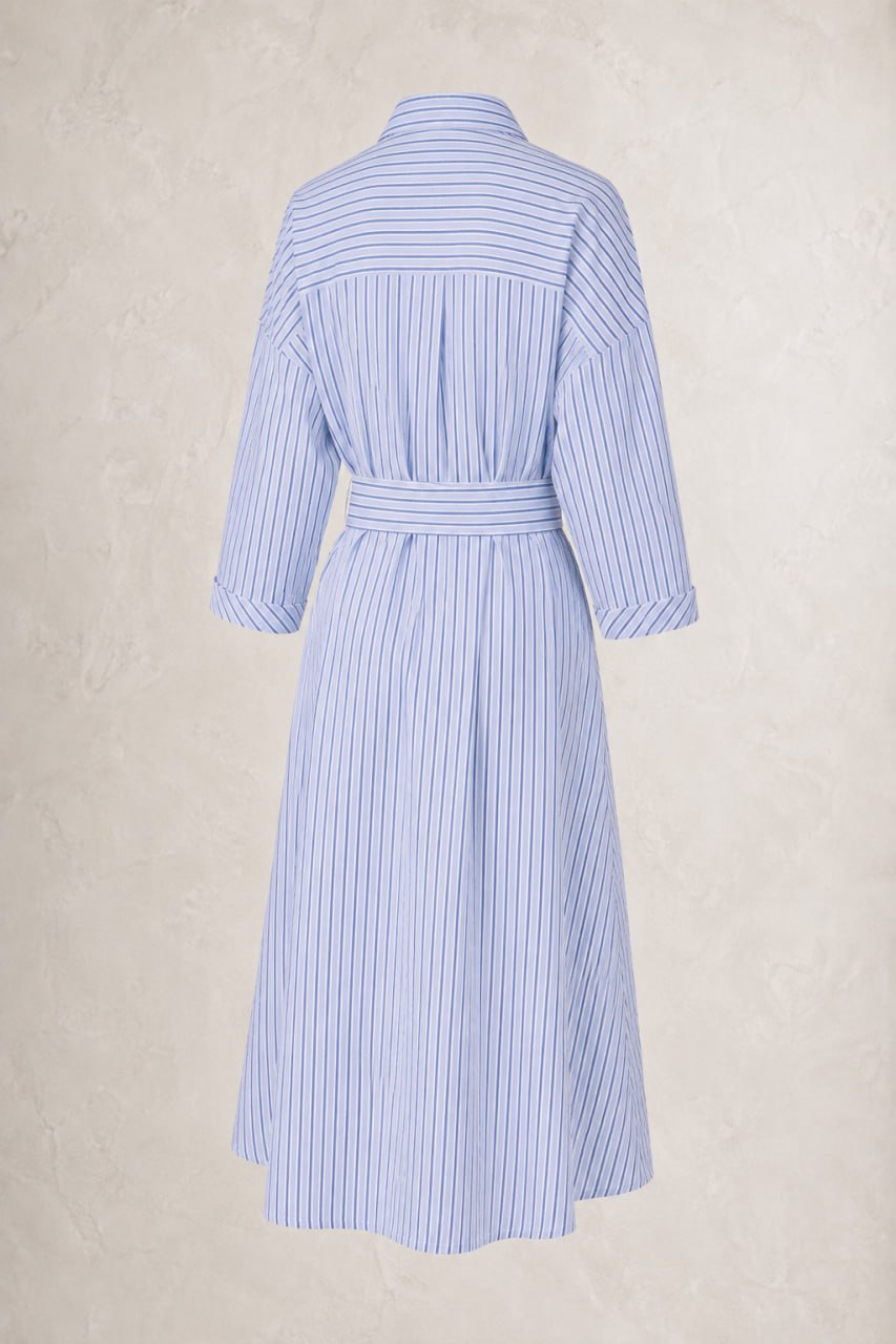 Light blue and white striped dress with a belt on a beige background