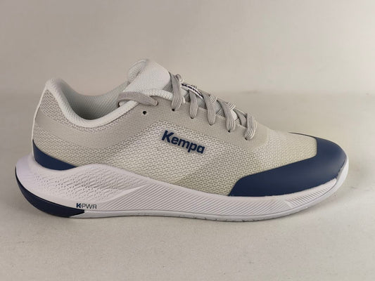 A light gray and white Kempa running shoe with navy blue accents on the toe cap and midsole, shown from a side profile against a neutral light gray background.