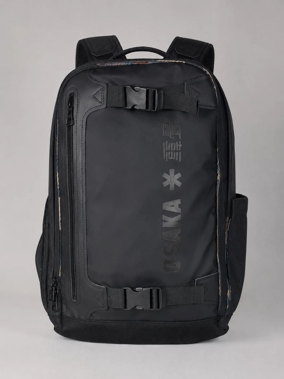 Black backpack with visible branding on a gray background