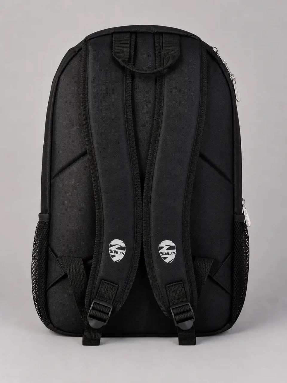Black backpack on a gray background
