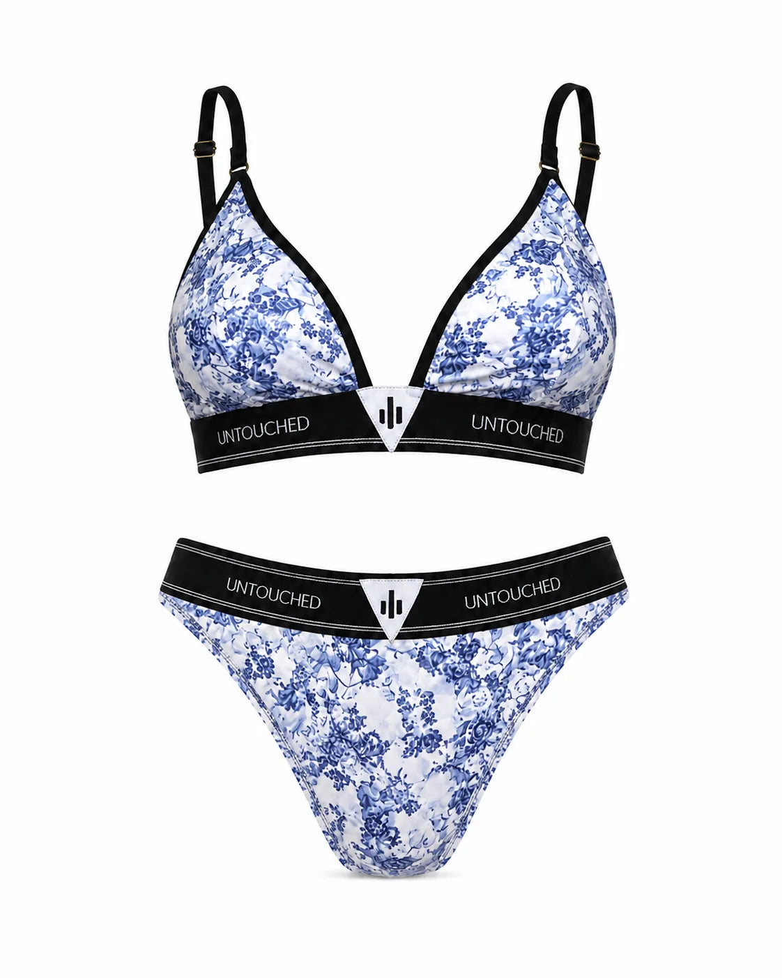 A two-piece bikini set with a blue and white floral toile pattern, featuring black trim and a black underband with the brand name 'UNTOUCHED' printed in white. The set includes a triangle bralette and a matching thong, displayed against a solid white background.