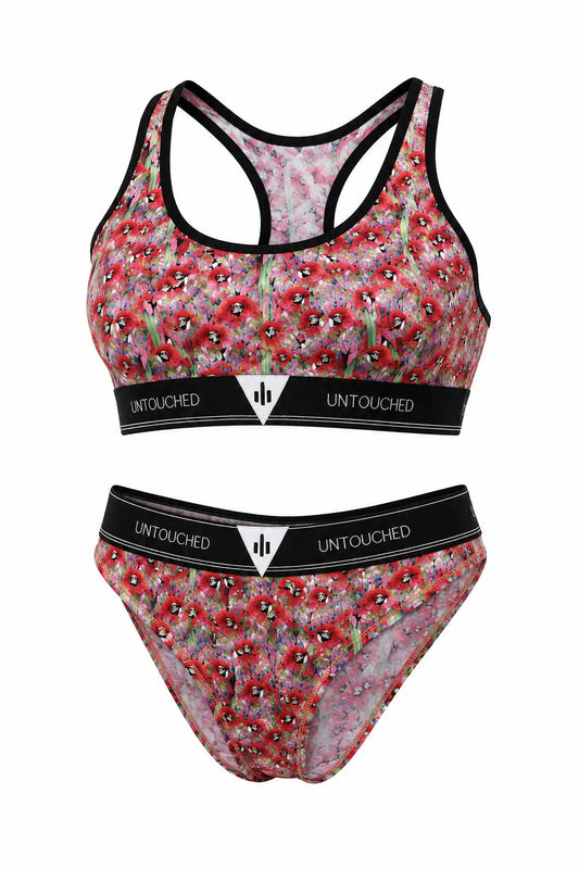 A two-piece bikini set featuring a red and pink floral print with black trim, displayed on a clean white background. The set includes a racerback sports bra top and matching high-cut bottoms, both with black waistbands displaying the brand name 'UNTOUCHED'.