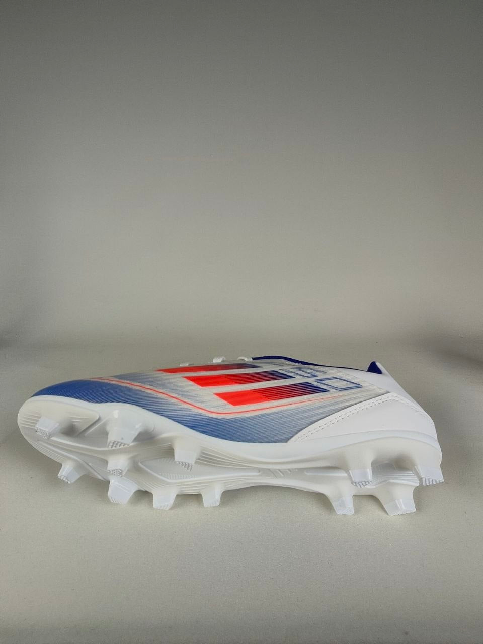 Adidas F50 Club FxG Soccer Cleats – White/Red/Blue