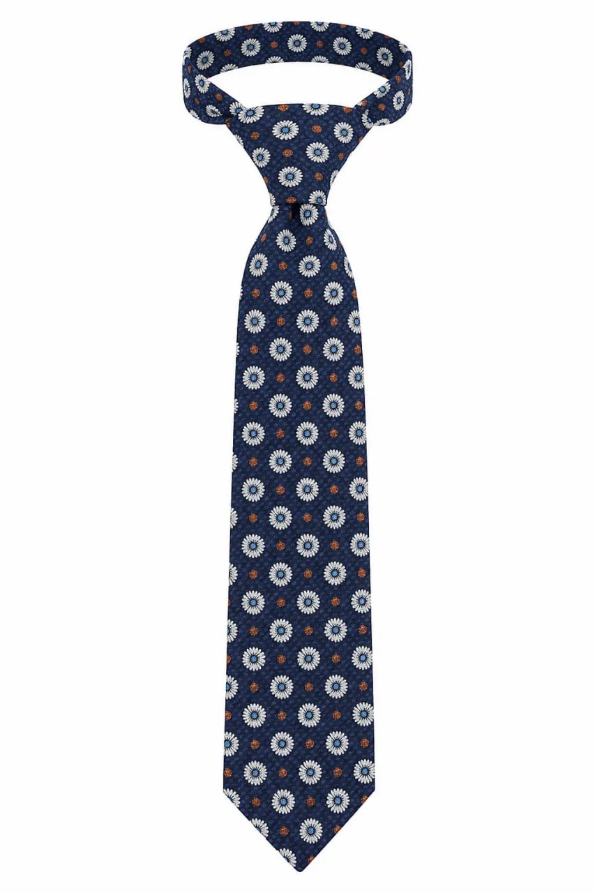 Navy floral patterned tie on a white background